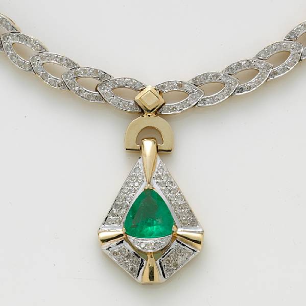 Appraisal: An emerald and diamond necklace the triangular-cut emerald measuring approximately