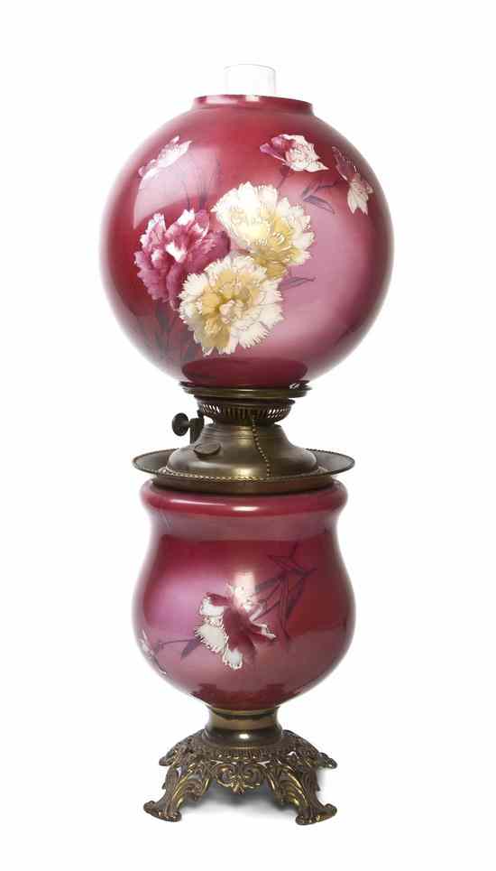 Appraisal: A Victorian Oil Lamp having a spherical painted shade and