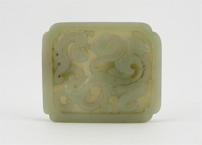 Appraisal: A Chinese pale celadon jade rectangular belt buckle carved with