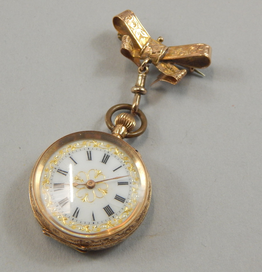 Appraisal: A fob watch in florally engraved case with bow bar