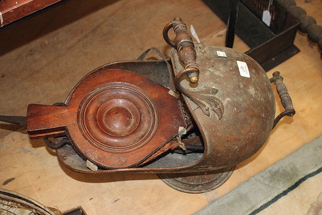 Appraisal: A VICTORIAN COPPER HELMET SHAPED COAL SCUTTLE together with a