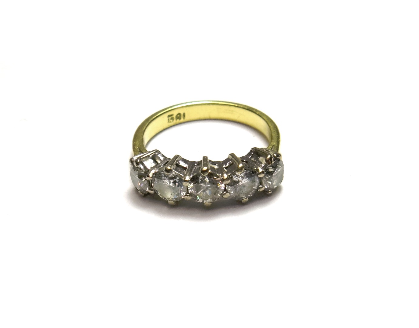 Appraisal: A gold and diamond set five stone ring claw set