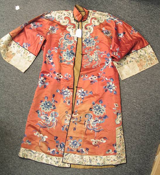 Appraisal: A peach ground embroidered lady's informal robe Late Qing Dynasty