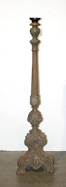 Appraisal: An Italian Baroque style painted and carved wood torch re