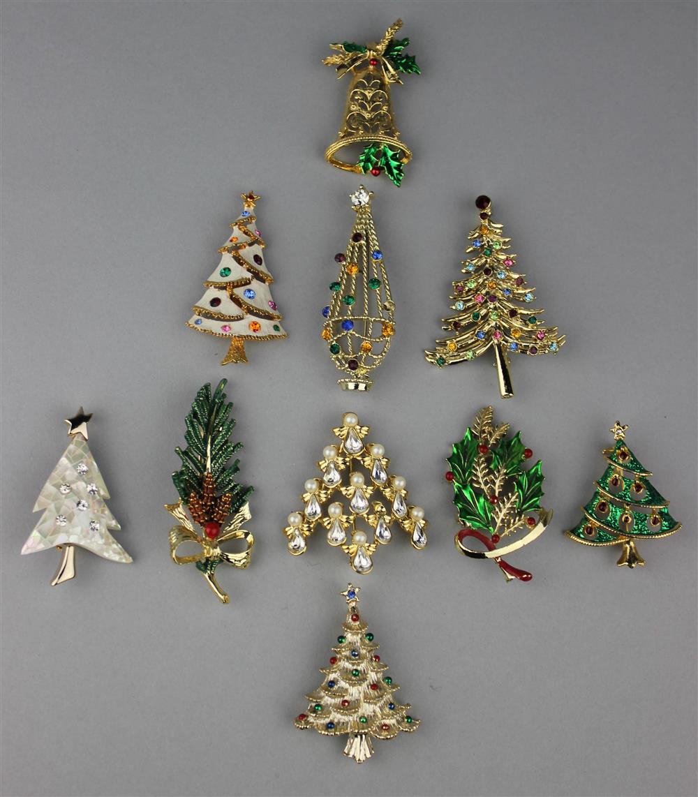 Appraisal: CHRISTMAS PIN COLLECTION NINA RICCI ANGEL CHRISTMAS TREE PIN DODD'S