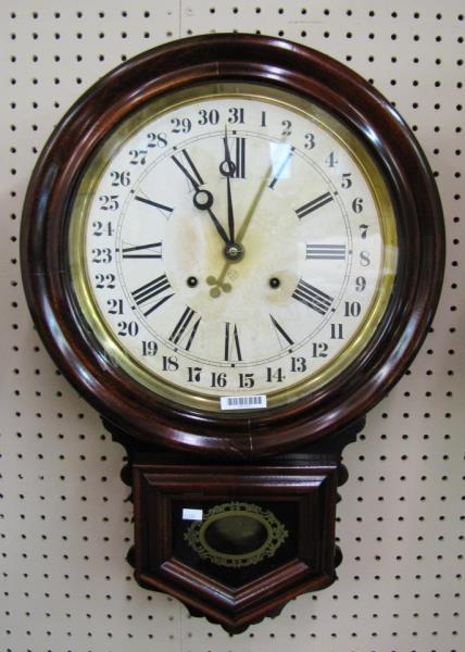 Appraisal: An antique Ansonia Regulator-style wall clock Roman numeral and calendar