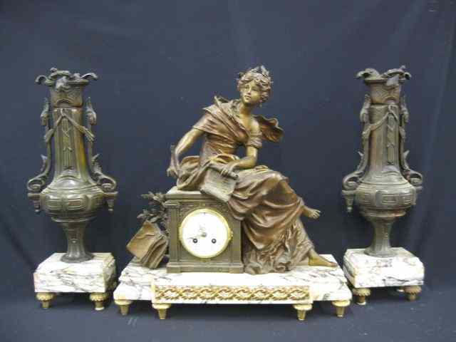 Appraisal: French Victorian Mantle Clock Garniture Set Bronzed seated lady with