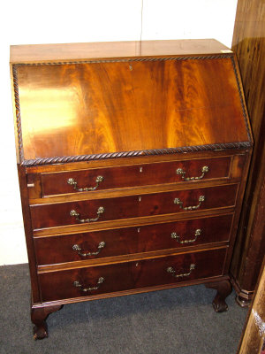 Appraisal: A mahogany fall front bureau the fitted interior above four