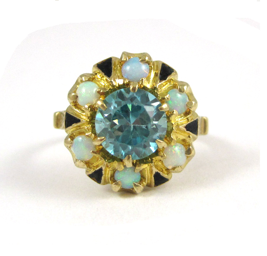 Appraisal: ZIRCON OPAL AND TEN KARAT GOLD RING with black enamel