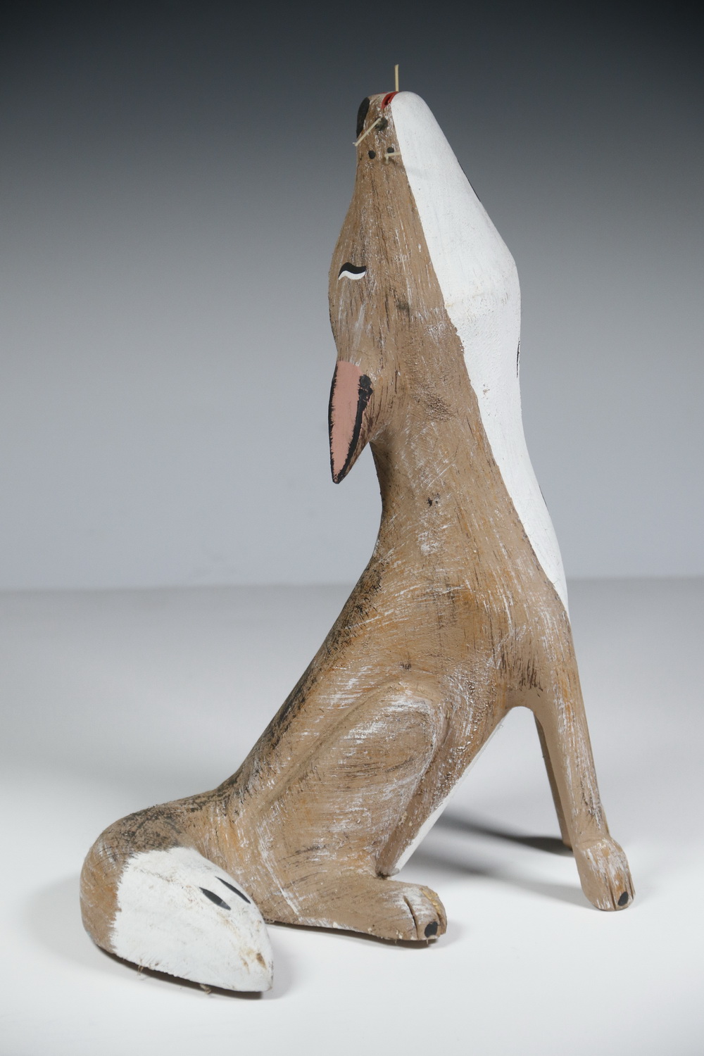 Appraisal: SCULPTURE Carved and painted sculpture of a fox by Hector