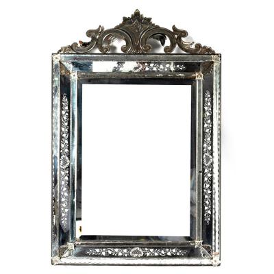 Appraisal: A late th Century Venetian mirror the bevelled oblong plate