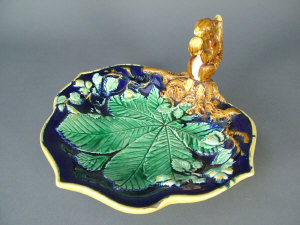 Appraisal: Majolica hazelnut dish possibly George Jones with moulded squirrel and