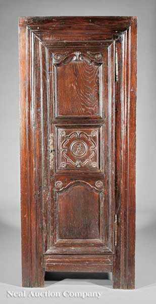 Appraisal: An Antique Italian Carved Walnut or Elm Bonneti re th