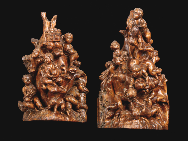 Appraisal: Interesting Pair of German Elaborately Carved Root Sculptures featuring boys