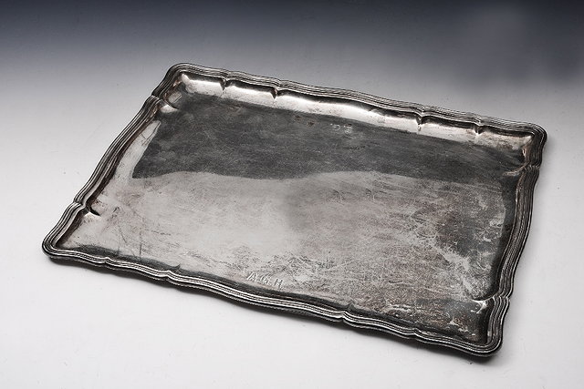 Appraisal: A GRADE CONTINENTAL SILVER TRAY of shaped rectangular form cm