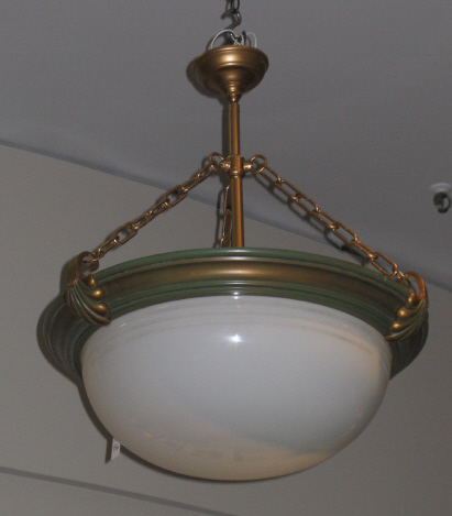 Appraisal: ART DECO POLYCHROMED LIGHT FIXTURE the central brass ring supporting