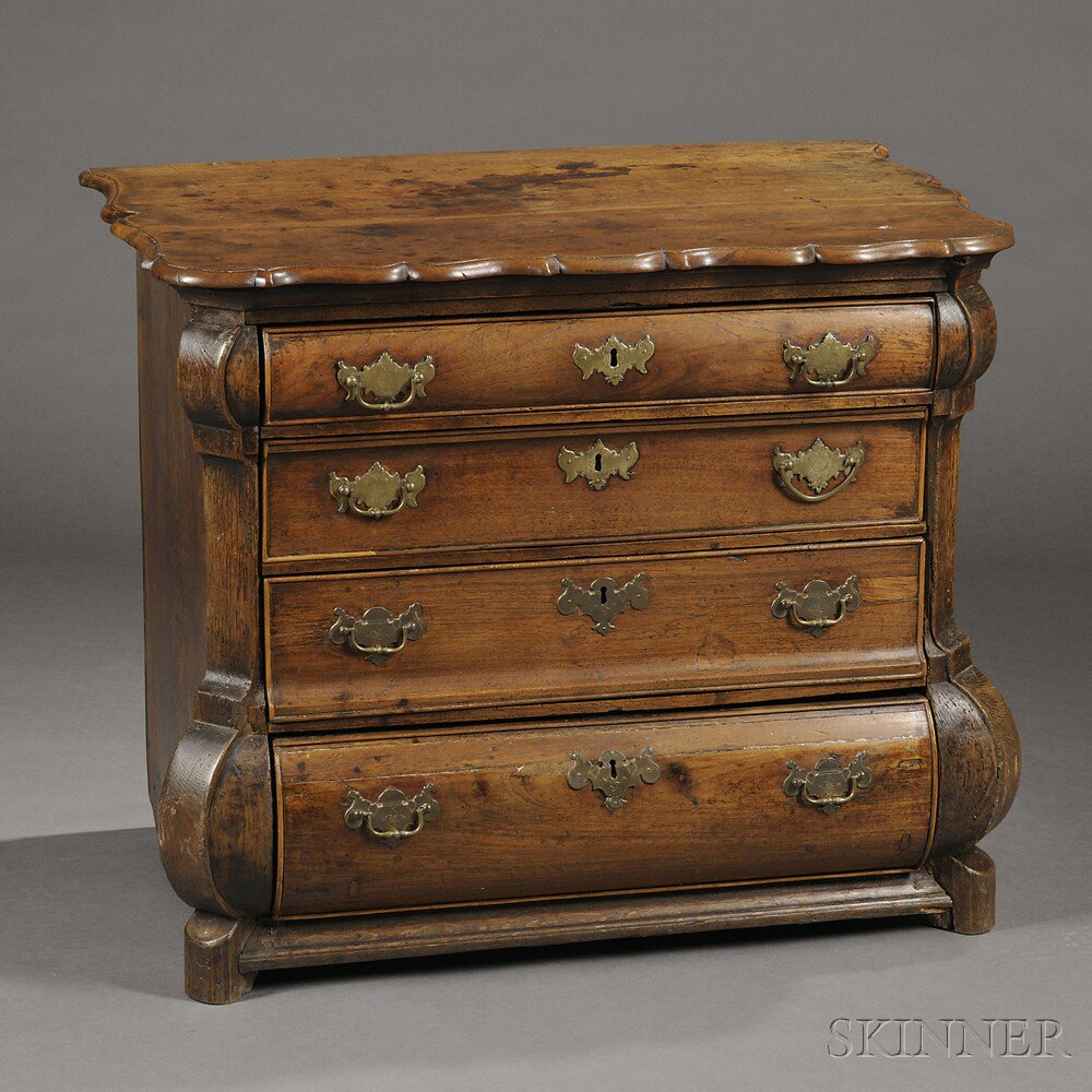 Appraisal: Baroque-style Walnut Bombe Commode th th century the cusped surface