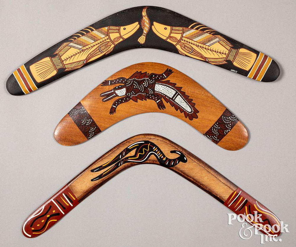 Appraisal: Three Australian boomerangs with painted fish Three Australian boomerangs with