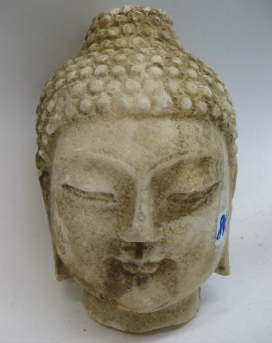 Appraisal: AN OFF-WHITE MARBLE SCULPTURE the head of Gautama Buddha Height