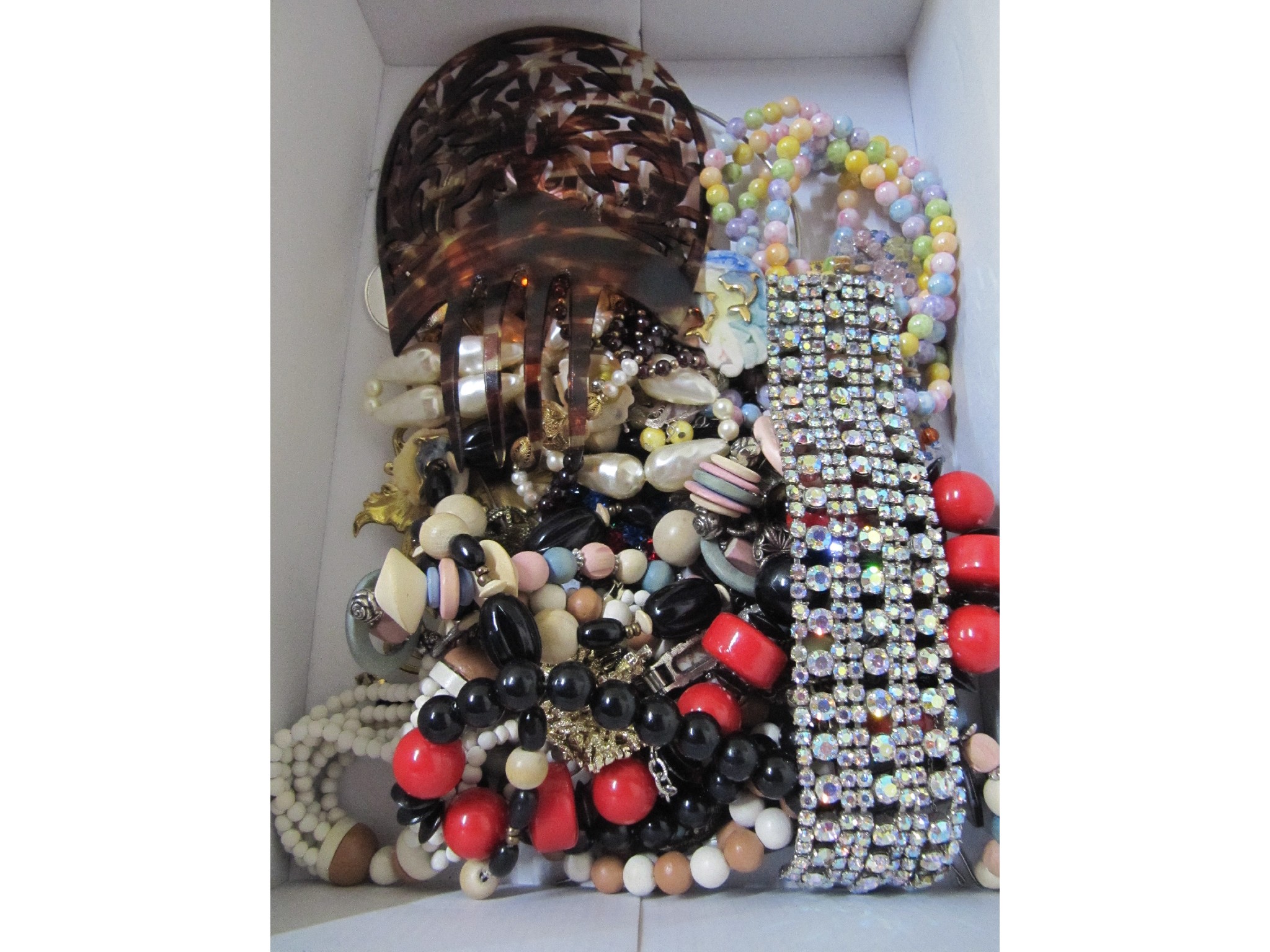 Appraisal: A box of costume jewellery hair comb etc