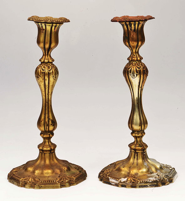 Appraisal: A PAIR OF TH CENTURY POSSIBLY FRENCH SILVER PLATED CANDLESTICKS