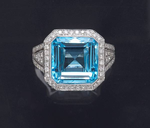 Appraisal: A topaz and diamond ring topaz weighing carats mounted in