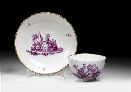 Appraisal: CUP AND SAUCER WITH WATTEAUESQUE SCENES IN PURPUR Ansbach circa