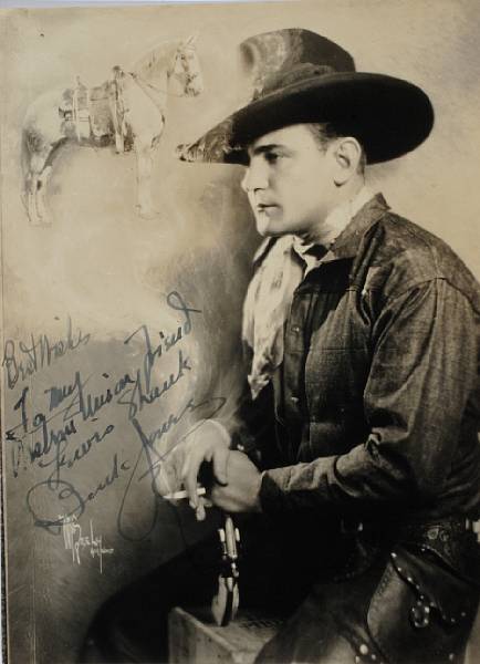 Appraisal: A Buck Jones signed sepia photograph s A vintage print