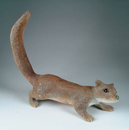 Appraisal: CARVED AND PAINTED GRAY SQUIRREL Life-like carving shows squirrel on