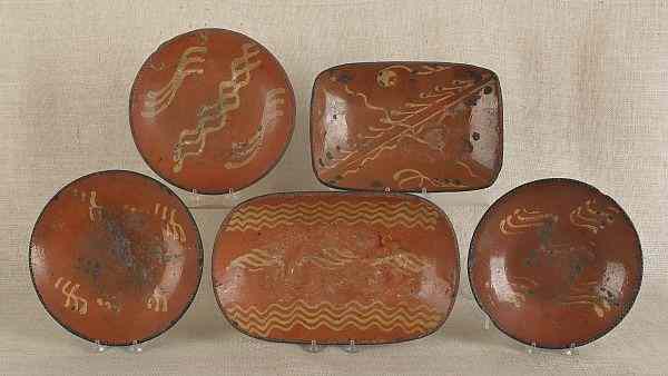 Appraisal: Two redware loaf dishes th c together with three pie