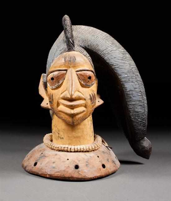 Appraisal: Yoruba carved and painted headpiece depicting Eshu Western Nigeria first