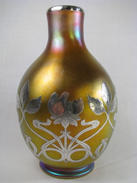 Appraisal: Quezal art glass vase with silver overlay floral design Iridescent