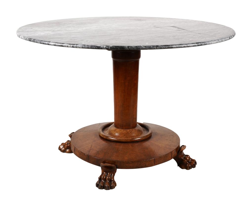 Appraisal: CONTINENTAL CARVED WALNUT MARBLE-TOP PEDESTAL TABLEclaw feet Provenance The Estate