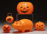 Appraisal: FIVE HARD PLASTIC JACK-O-LANTERNS AND LARGE PIG BANK Two trick-or-treat