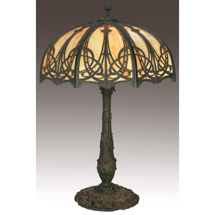 Appraisal: Wilkinson lamp slag glass shade with elaborate metal overlay design