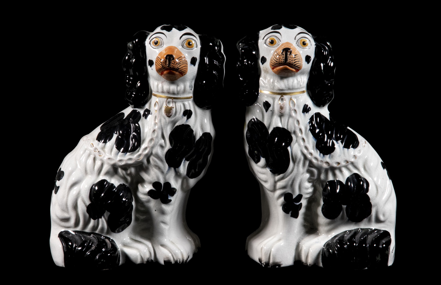 Appraisal: PR STAFFORDSHIRE SPANIEL FIGURINES Pair of English Ceramic Seated King