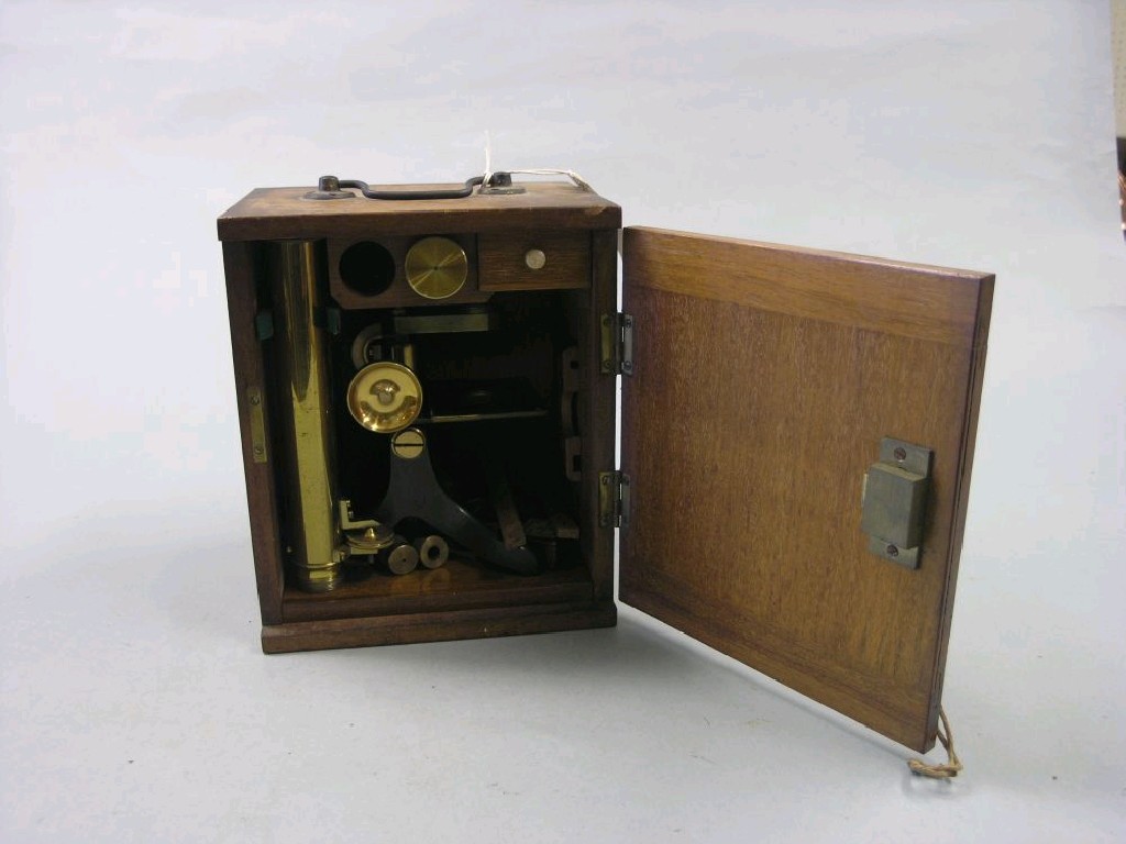 Appraisal: An early th century microscope by T Henri Co London