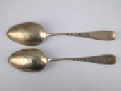 Appraisal: An unusual pair of Russian silver tablespoons of Old English