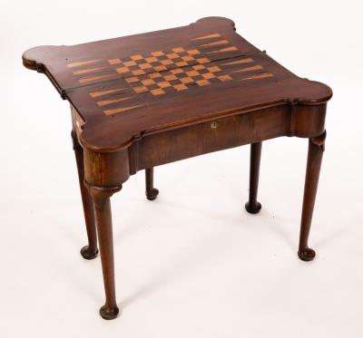 Appraisal: A George II walnut triple-flap gaming table the second flap