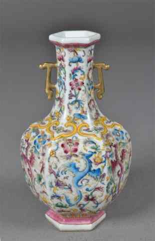 Appraisal: Chinese Famille Rose Porcelain Phoenix VasePorcelain footed Famille Rose phoenix