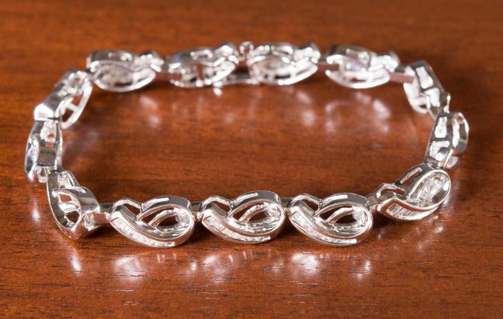 Appraisal: DIAMOND AND FOURTEEN KARAT WHITE GOLD BRACELET - in length