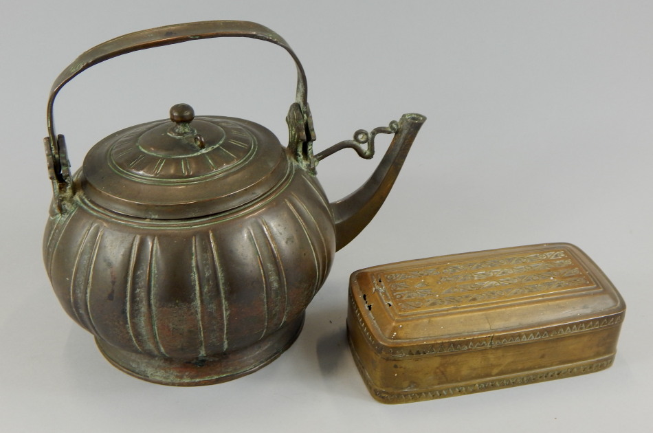 Appraisal: An oriental bronze teapot of melon form with a swing