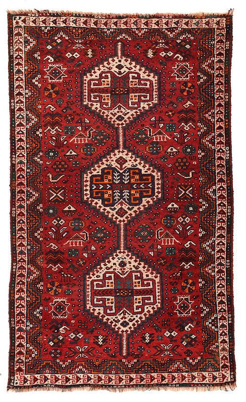 Appraisal: Persian Rug th century three serrated edged medallions on a