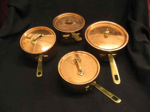 Appraisal: Copper Pots with Lids brass handled polished graduated