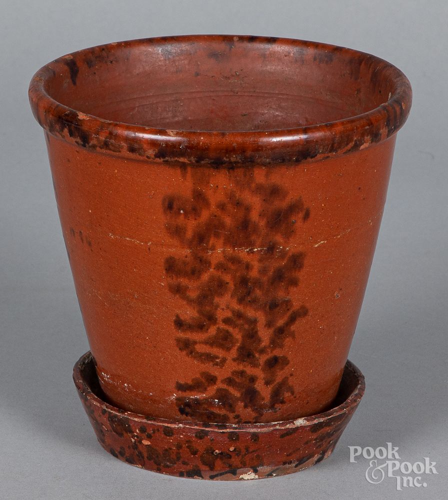 Appraisal: Pennsylvania redware flowerpot and undertray Pennsylvania redware flowerpot and undertray