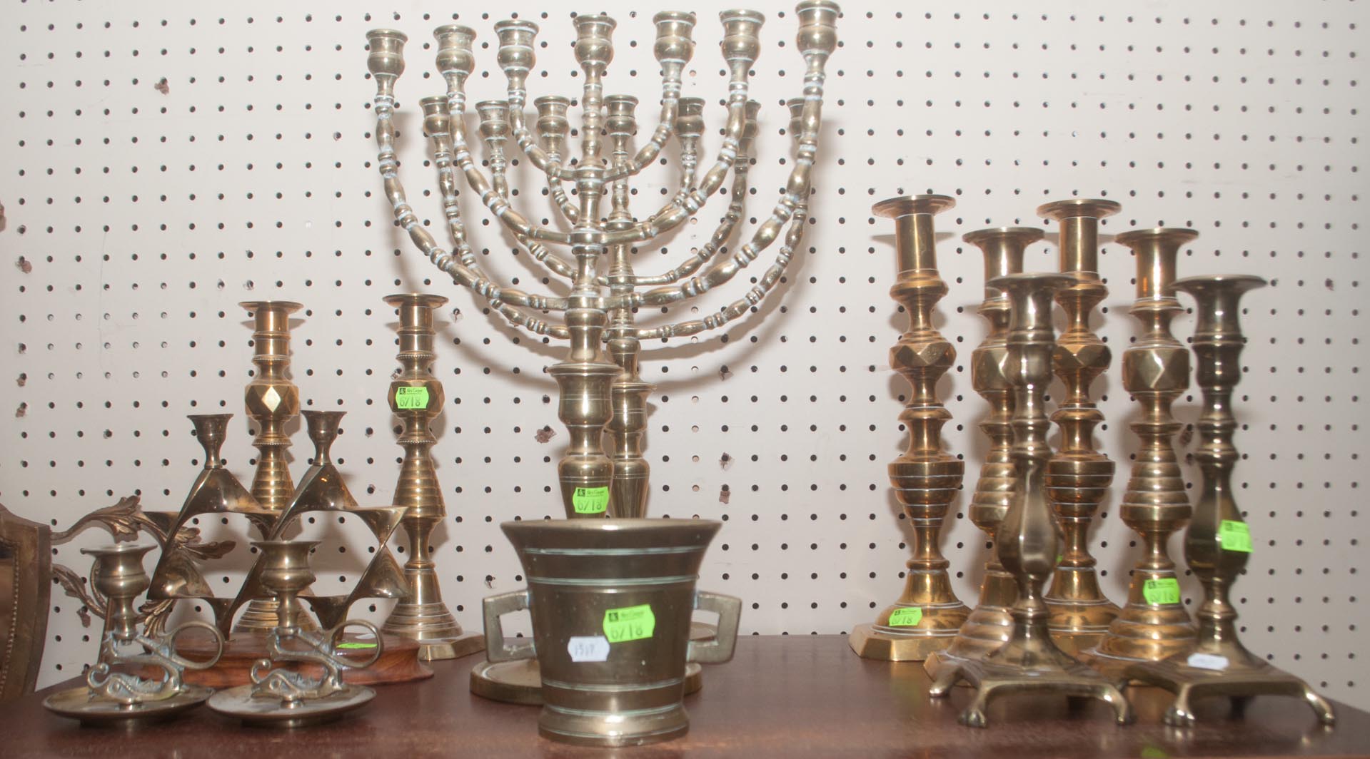 Appraisal: Assortment of brass items including six pairs of candlesticks menorah