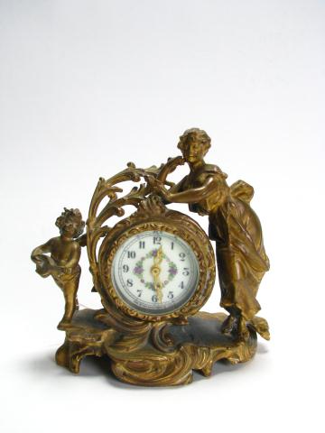 Appraisal: New Haven figural spelter mantel clock depicting female and cherub