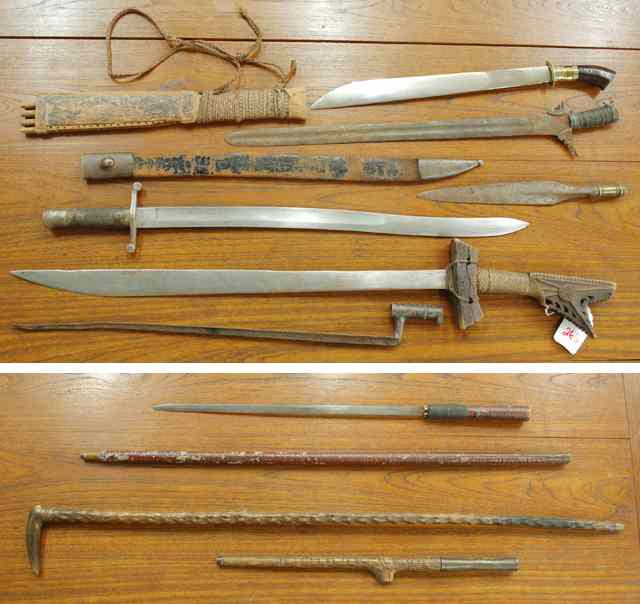 Appraisal: SIX EDGED WEAPONS PLUS THREE CANES three Indonesian swords ''