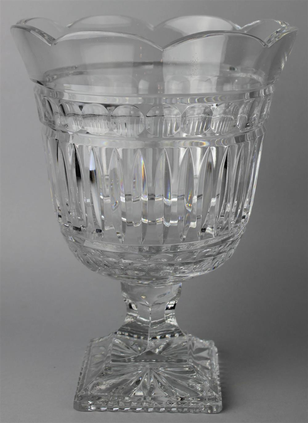 Appraisal: A LARGE GLASS FOOTED BOWL with scalloped rim above a