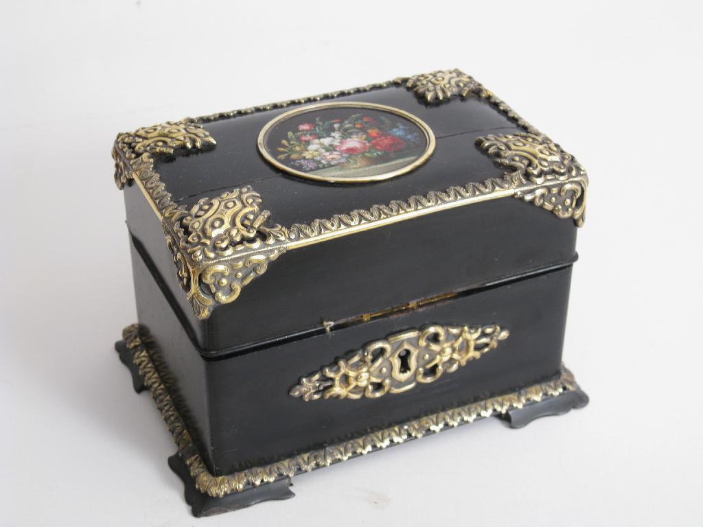 Appraisal: A th Century ebonised Scent Bottle Box with circular panel